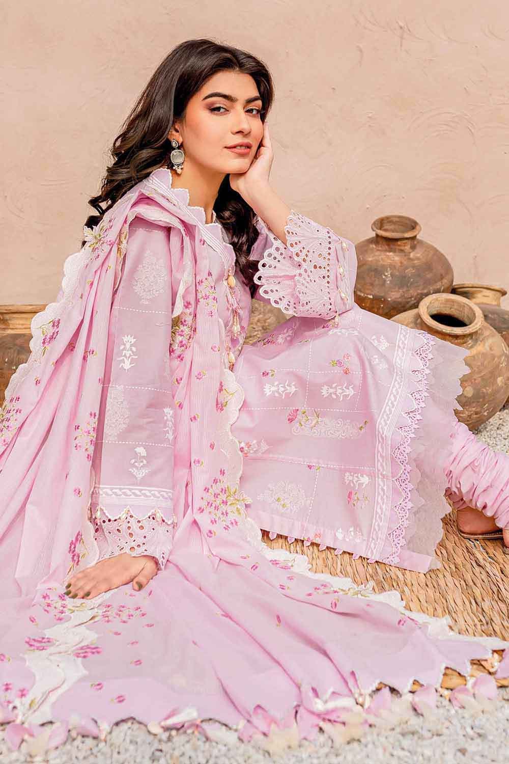 Zahra Ahmad - Blush pink printed lawn pleated peplum top with frilled umbrella  sleeves, embellished laces on bodice and gold lace around flare and sleeves.  Beige cotton plain pleated gharara with silver